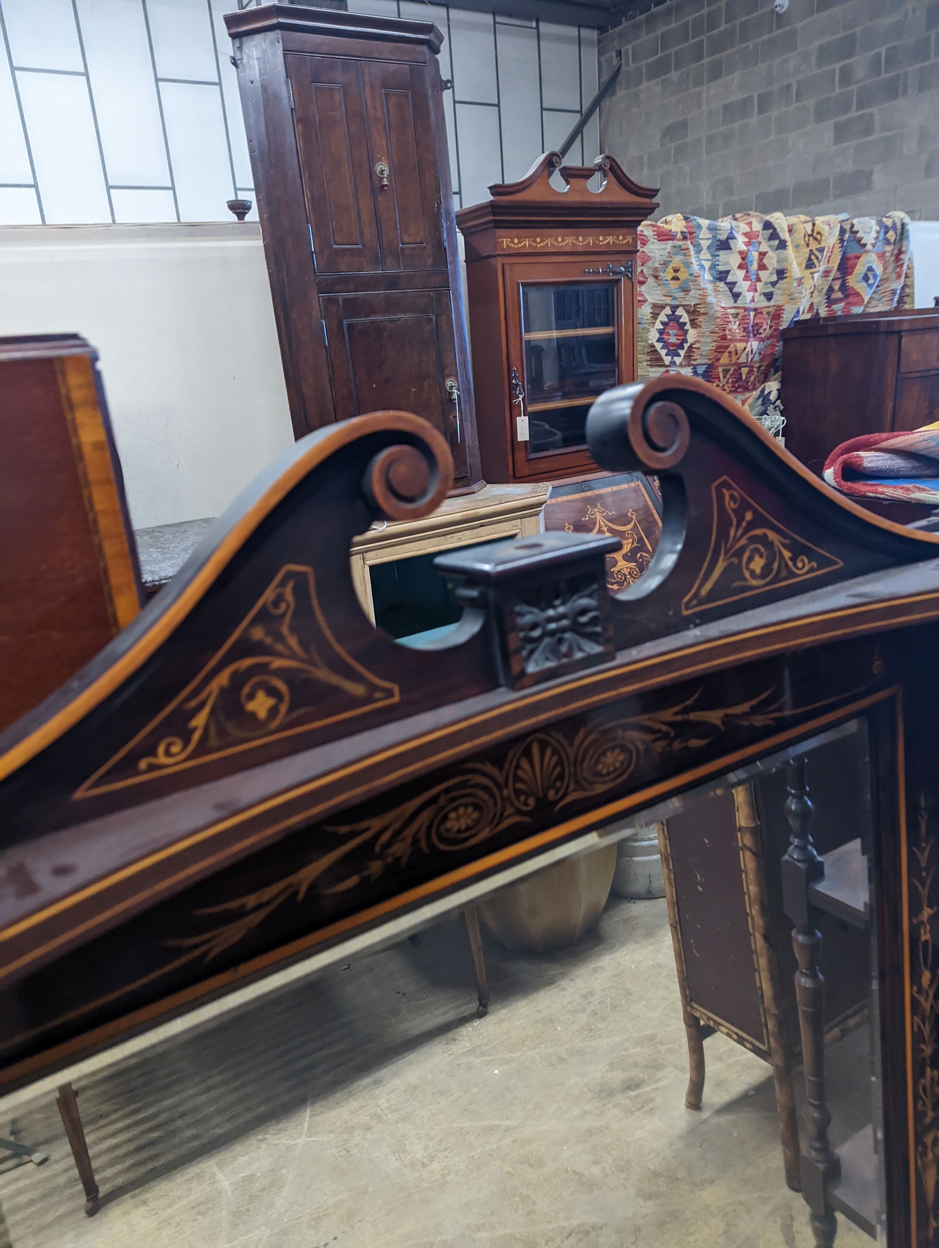A late Victorian marquetry inlaid rosewood overmantel mirror, width 150cm, height 140cm